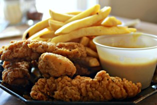 Customer Colleen Coneita enjoyed an order of chicken fingers and fries on Friday, September 6th. - © Tabitha Guarnieri